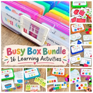 May include: A Busy Box Bundle featuring 16 learning activities in a clear plastic storage case with colorful internal containers. The set includes various educational cards, plastic shapes, counting links, and pom-poms for interactive play.