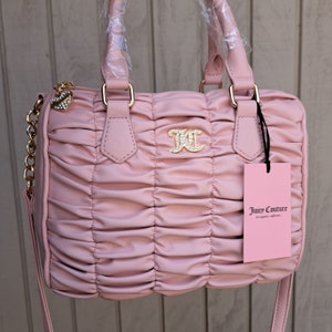 juicy couture run the world satchel