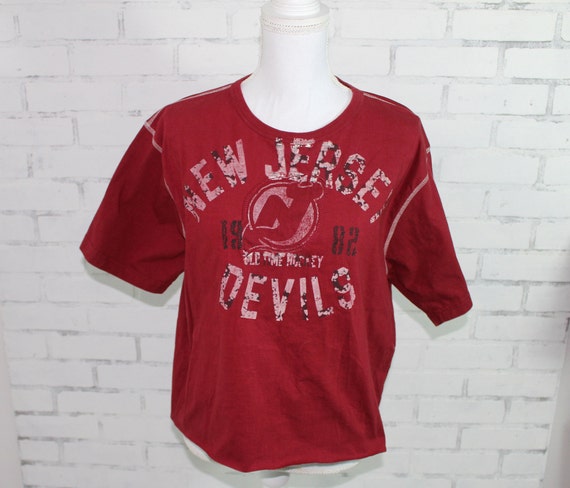 VINTAGE NJ DEVILS BLACK/RED STARTER JERSEY - Primetime