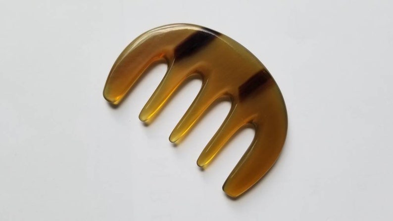 Travel-sized yak horn comb for women — five wide teeth, amber and brown natural horn, pocket size — Arakicrafts