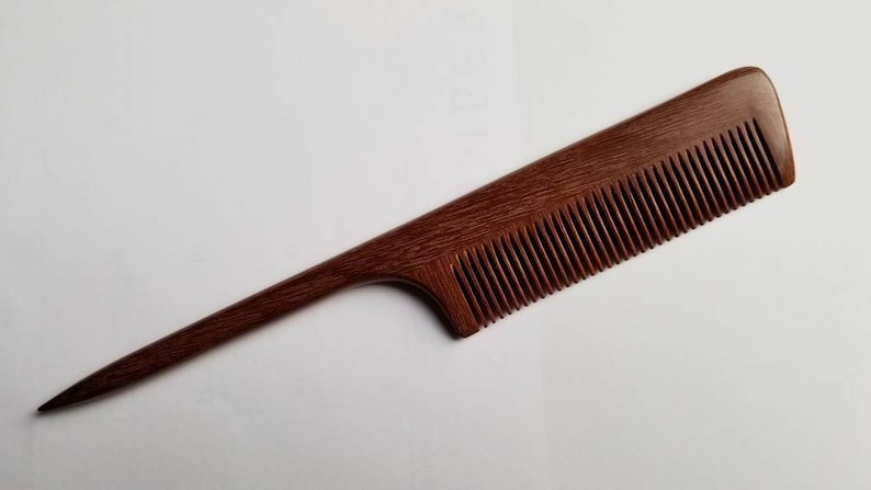 Handcrafted rat tail wood comb with fine teeth, pau rosa wood, designed for precision sectioning.  Suitable for hair styling and hair braiding. Eco luxury gift for her