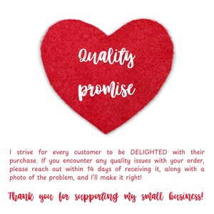 a red heart with the words quality promise written on it