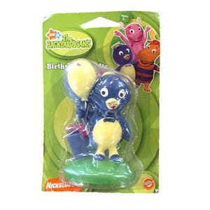 May include: A Backyardigans birthday cake topper featuring Pablo the penguin holding a yellow balloon and a gift. The packaging includes the Nickelodeon and Backyardigans logos, and the word "Birthday".