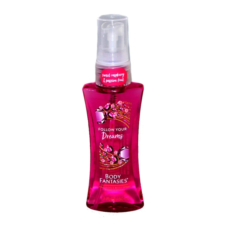 May include: A pink Body Fantasies fragrance spray bottle with a clear cap. The bottle has the words "Follow Your Dreams" and "sweet raspberry & passion fruit" printed on it. The bottle contains 4.0 fl oz / 118 ml.