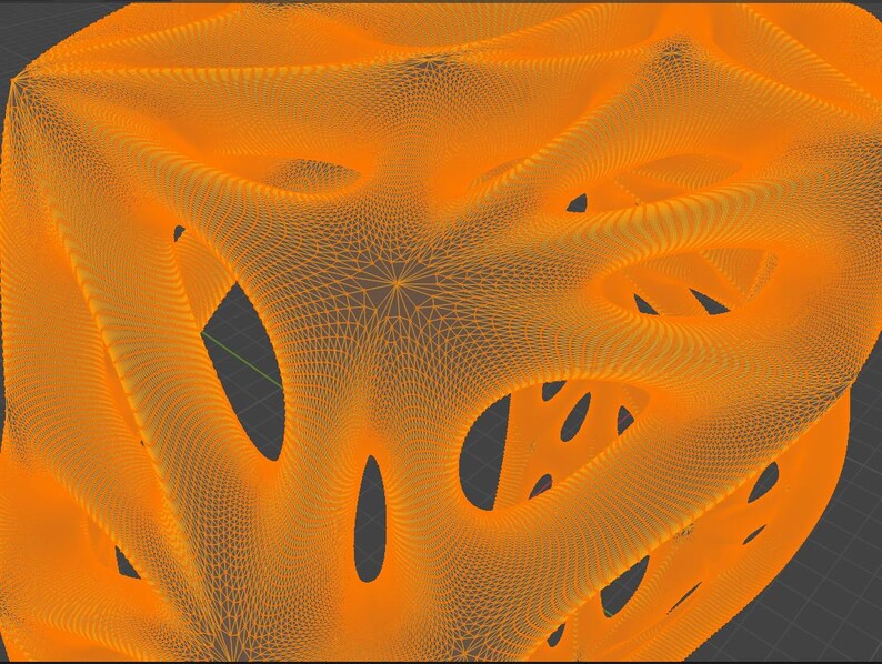 May include: An orange 3D model of a complex, organic shape with many holes and curves. The model is made of a wireframe mesh.