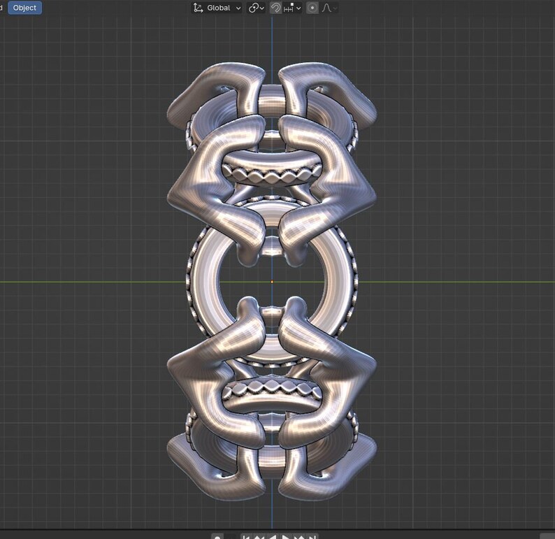 May include: A silver metal sculpture with a complex, interlocking design. The sculpture is made up of multiple rings and loops that are connected in a way that creates a sense of movement and energy.