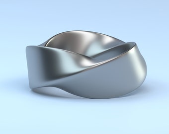 May include: A silver-colored, smooth, abstract ring with a twisted design.