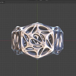 May include: A silver, geometric, 3D printed ring with a complex, intricate design. The ring is made of many small, interconnected shapes that create a web-like pattern.