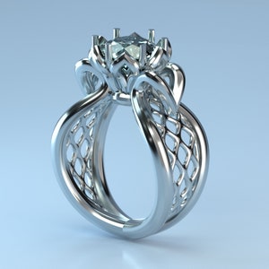 Puede incluir: Un anillo de plata con una gran piedra preciosa transparente engastada en un diseño floral. La banda está intrincadamente detallada con un patrón tejido.