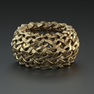 May include: A gold-colored ring with a woven, intricate design. The ring is made of a series of interconnected loops that create a complex pattern.