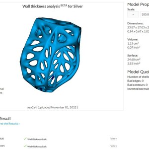 May include: A 3D model of a blue, intricate, lattice-like object. The model is labeled "Wall thickness analysis BETA for Silver" and shows the results of a wall thickness analysis for the model. The analysis indicates that the wall thickness is sufficient for both Polyamide (SLS) and Polyamide (MJF) materials.