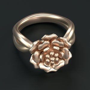 May include: A rose gold ring with a delicate flower design. The flower is made up of multiple petals and has a cluster of small round accents in the center.