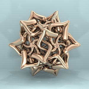 May include: A gold-coloured, abstract, geometric sculpture with a star-like shape. The sculpture is made of many interconnected, curved, and twisted pieces.