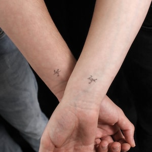 Tatuagens temporárias correspondentes de 1ª/2 e 2ª/2 (conjunto de 3+3)
