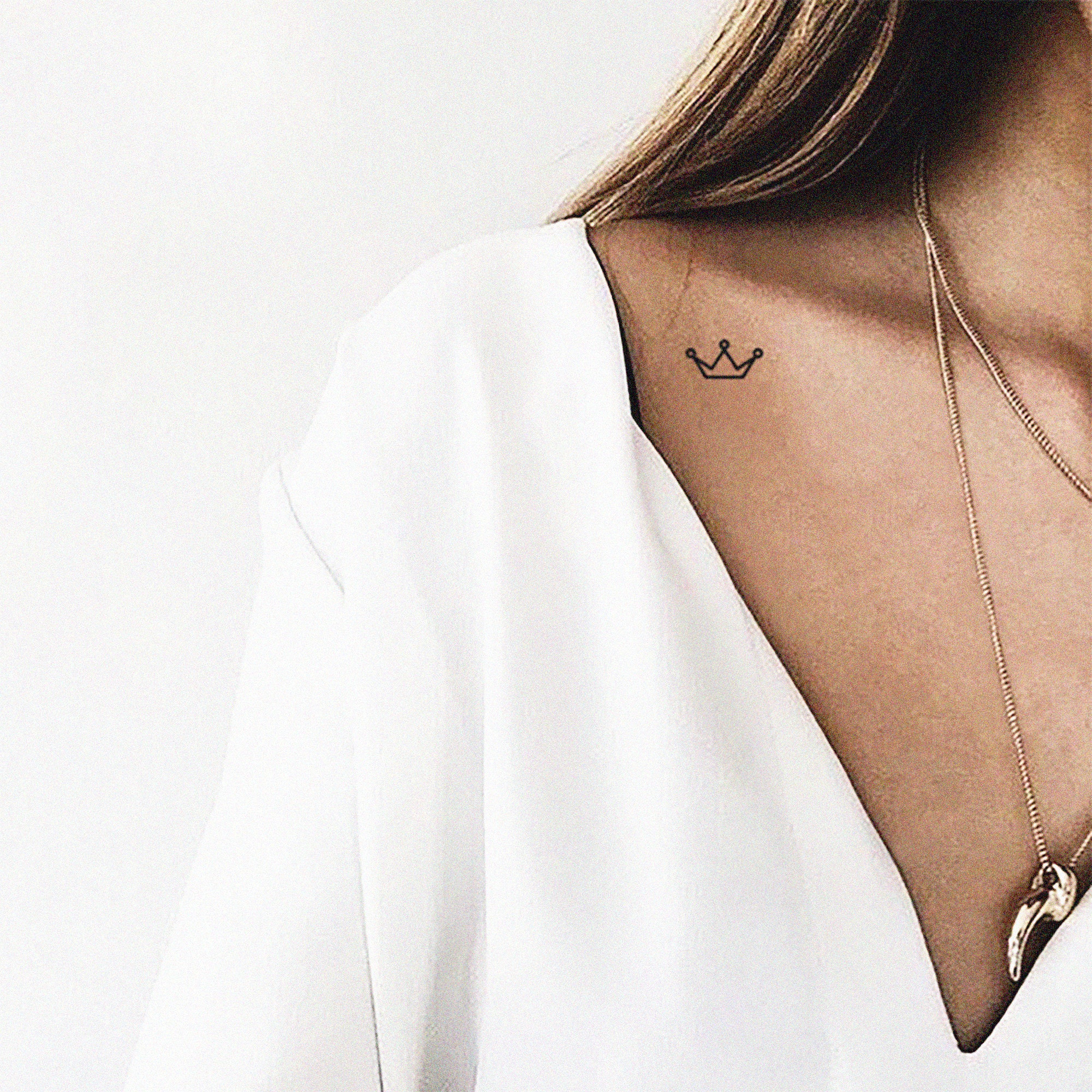 Collarbone Crown tattoo women at theYoucom