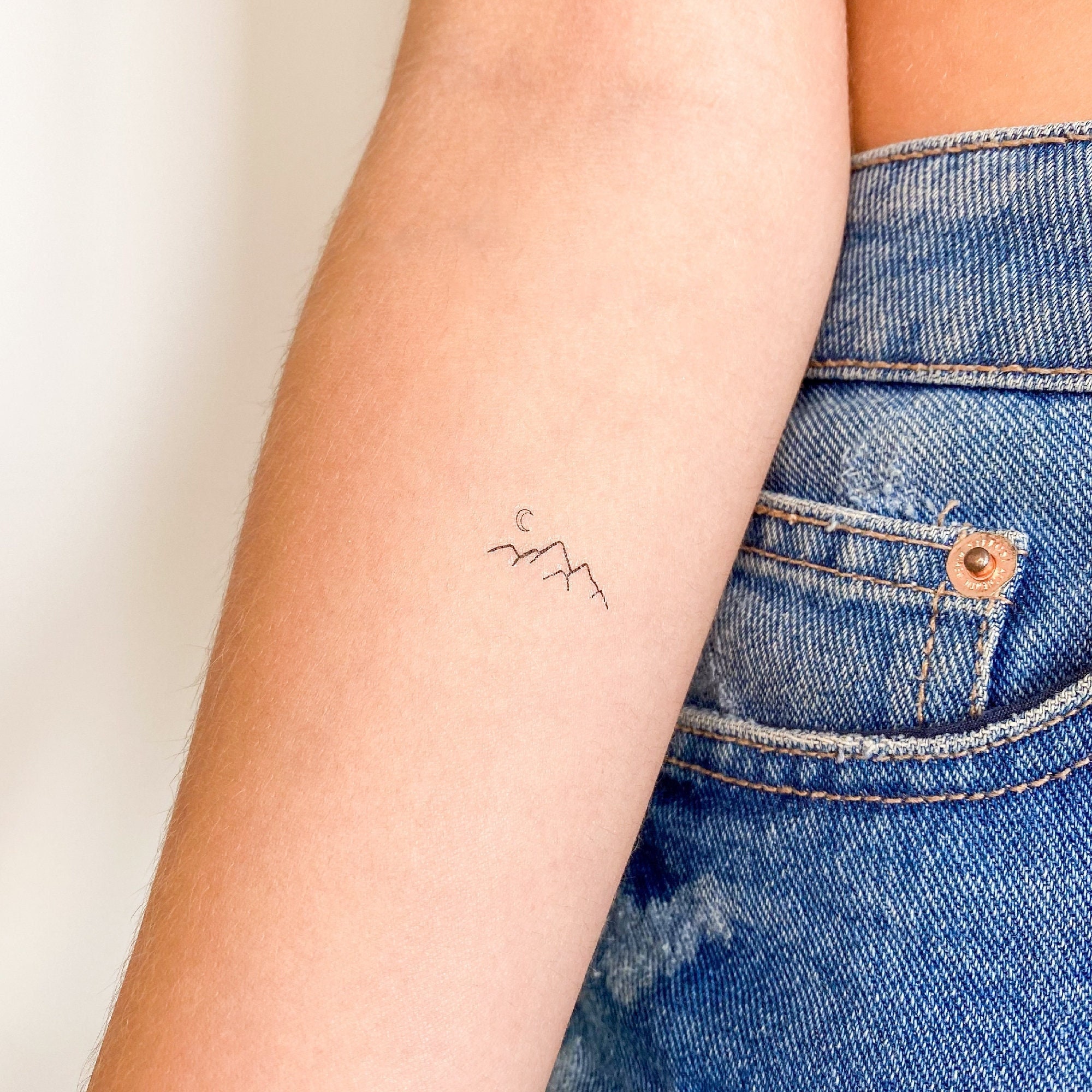Premium Photo | Delicate Constructions Oriental Minimalism in a Mountain  Tattoo