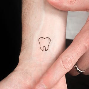Tatuaggio temporaneo del dente (set di 3)