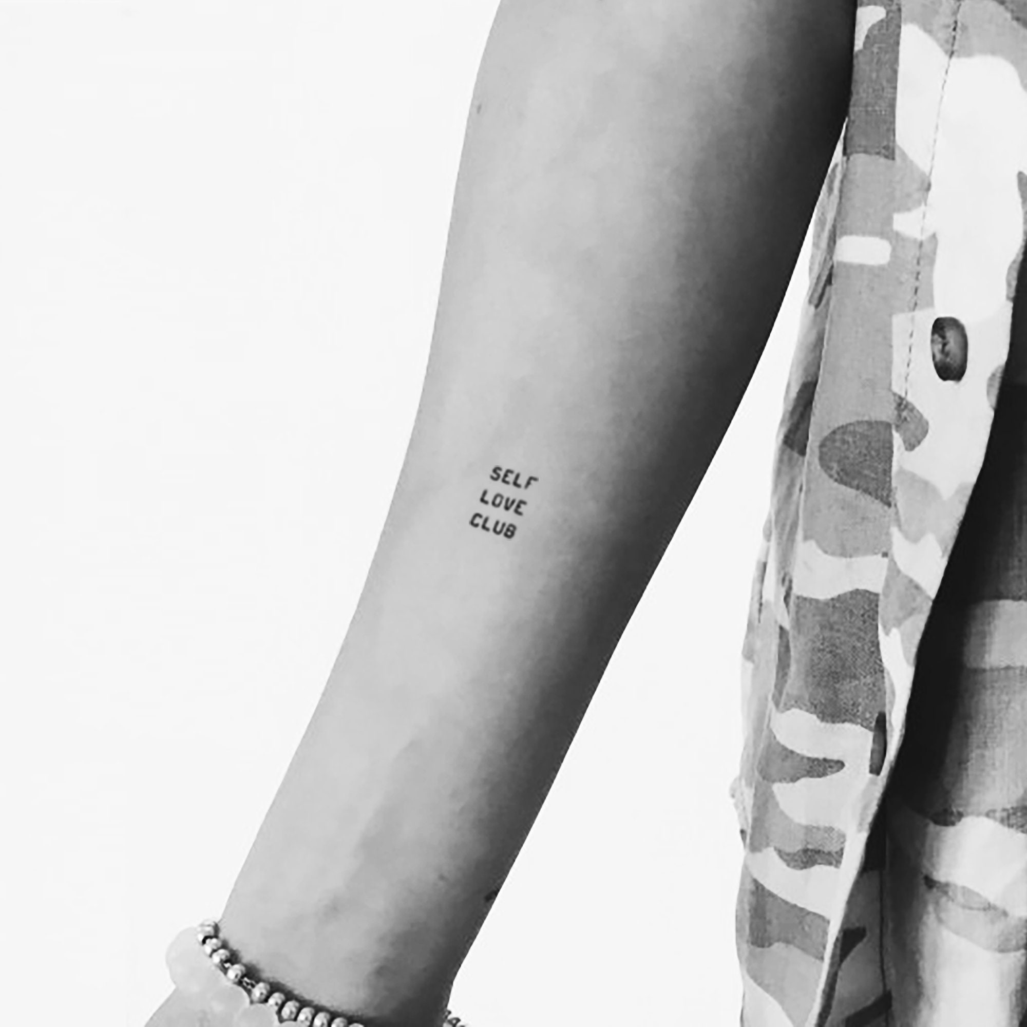 Minimalist self love tattoo on the rib