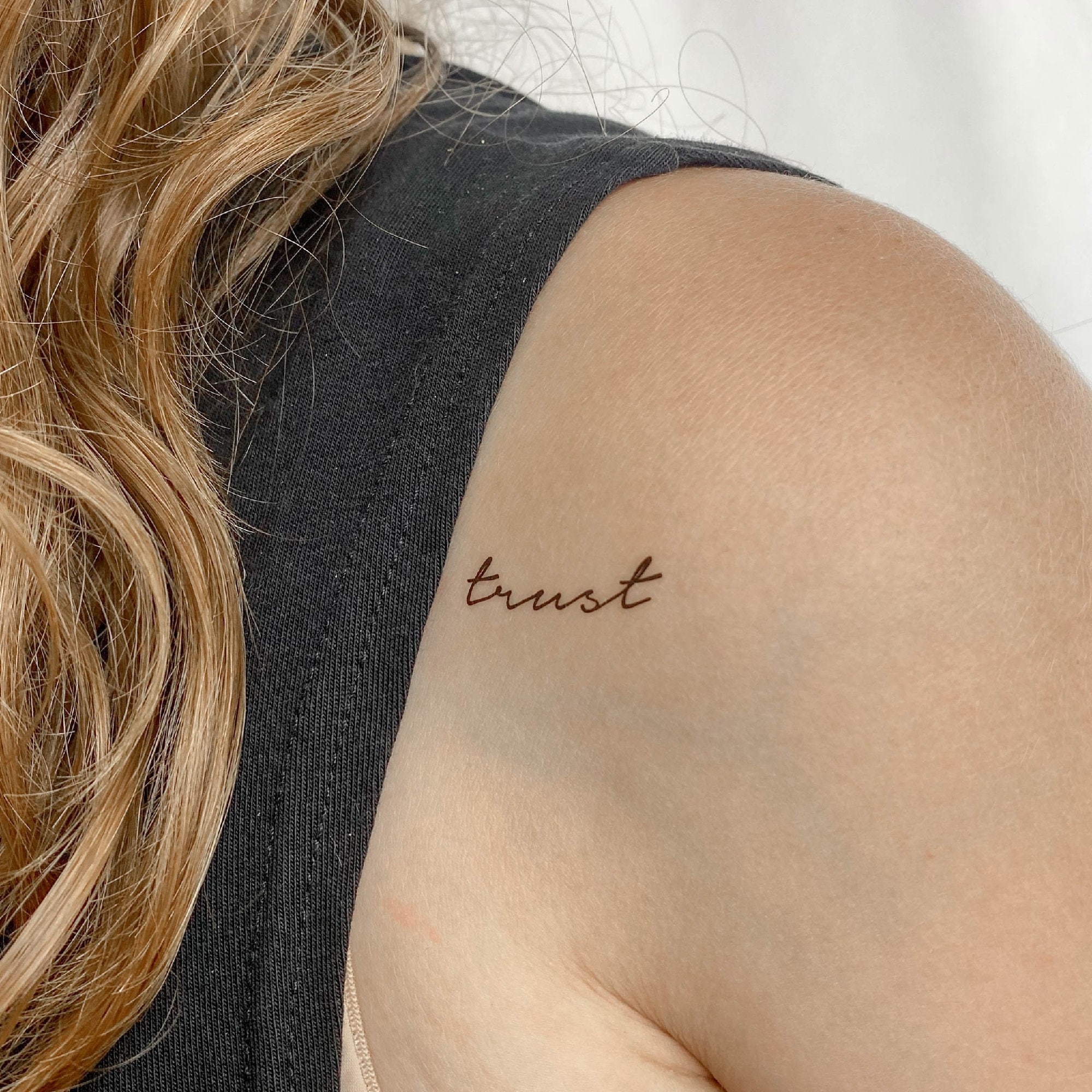 Female Trust No One Tattoo Meaning