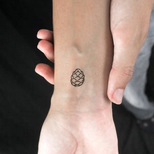 Tatuaggio temporaneo a forma di pigna (set da 3)