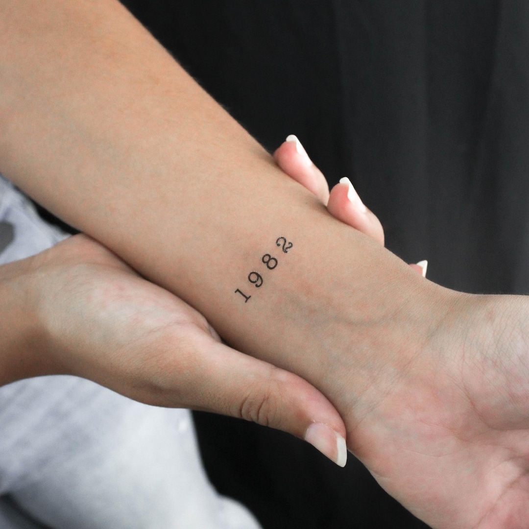 Birth Year Tattoo Behind Ear - A Personal Touch