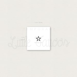 May include: A black star temporary tattoo, measuring 0.3 inches by 0.7 inches. The tattoo is on a white background.