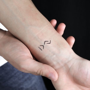 Ik ben groter dan de hoogte- en dieptepunten symbool tijdelijke tattoo (set van 3)