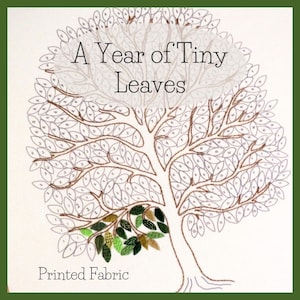 May include: A white fabric with a brown outline of a tree with leaves numbered 1 to 100. The leaves on the lower branches are embroidered in shades of green. The text "A Year of Tiny Leaves" is at the top of the image and "Printed Fabric" is at the bottom.