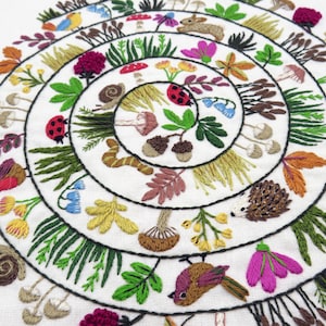 Round & Round the Woodland hand embroidery kit, embroidery fabric, embroidery thread.

Stitch a delightful woodland with birds, woodland creatures, grasses, flowers, mushrooms, berries and leaves! All in a wonderful and whimsical spiral design.