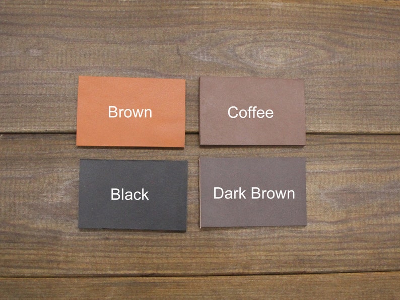May include: Four leather swatches in different shades of brown. The swatches are labeled "Brown", "Coffee", "Black", and "Dark Brown".