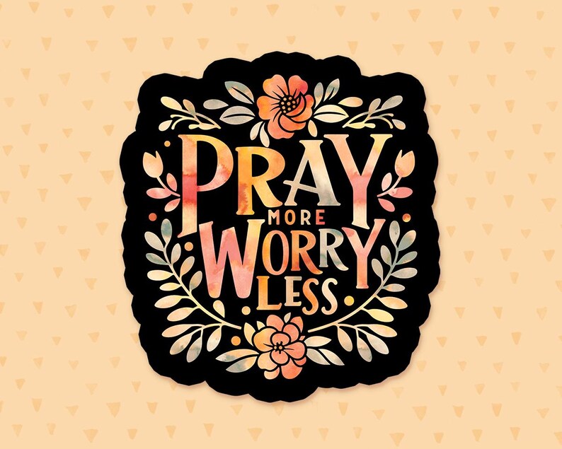 May include: A black and white sticker with a watercolor design of floral accents and the text "Pray More Worry Less".