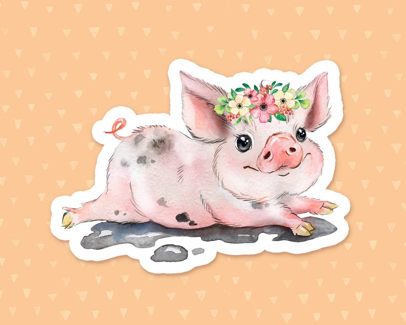 May include: A watercolor illustration of a pink piglet wearing a flower crown. The piglet is lying on its belly with its legs outstretched. The piglet has black spots on its body and is surrounded by a white border.