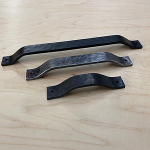 Hand forged cabinet pulls. Hammered Cobblestone texture. (Cornell)
