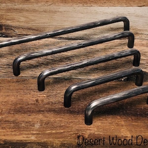 Hand forged hammered cabinet pulls. 1/2” round stock. (Cody)