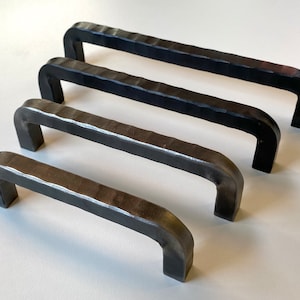 Hand forged hammered cabinet pulls. 1/2” square stock. (Everett)