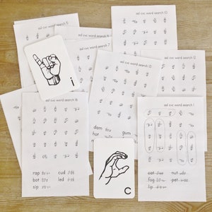 May include: A set of printable ASL word search worksheets for learning sign language. The worksheets feature different letters of the alphabet and corresponding sign language handshapes. The worksheets are designed for children learning sign language.