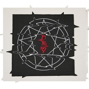 May include: Black embroidered patch with a white pentagram and a red symbol in the center. The pentagram is surrounded by a white circle with a wavy pattern.