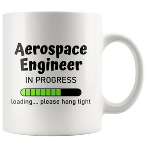 May include: White ceramic mug with black text that reads "Aerospace Engineer IN PROGRESS" with a green progress bar and the text "loading... please hang tight".