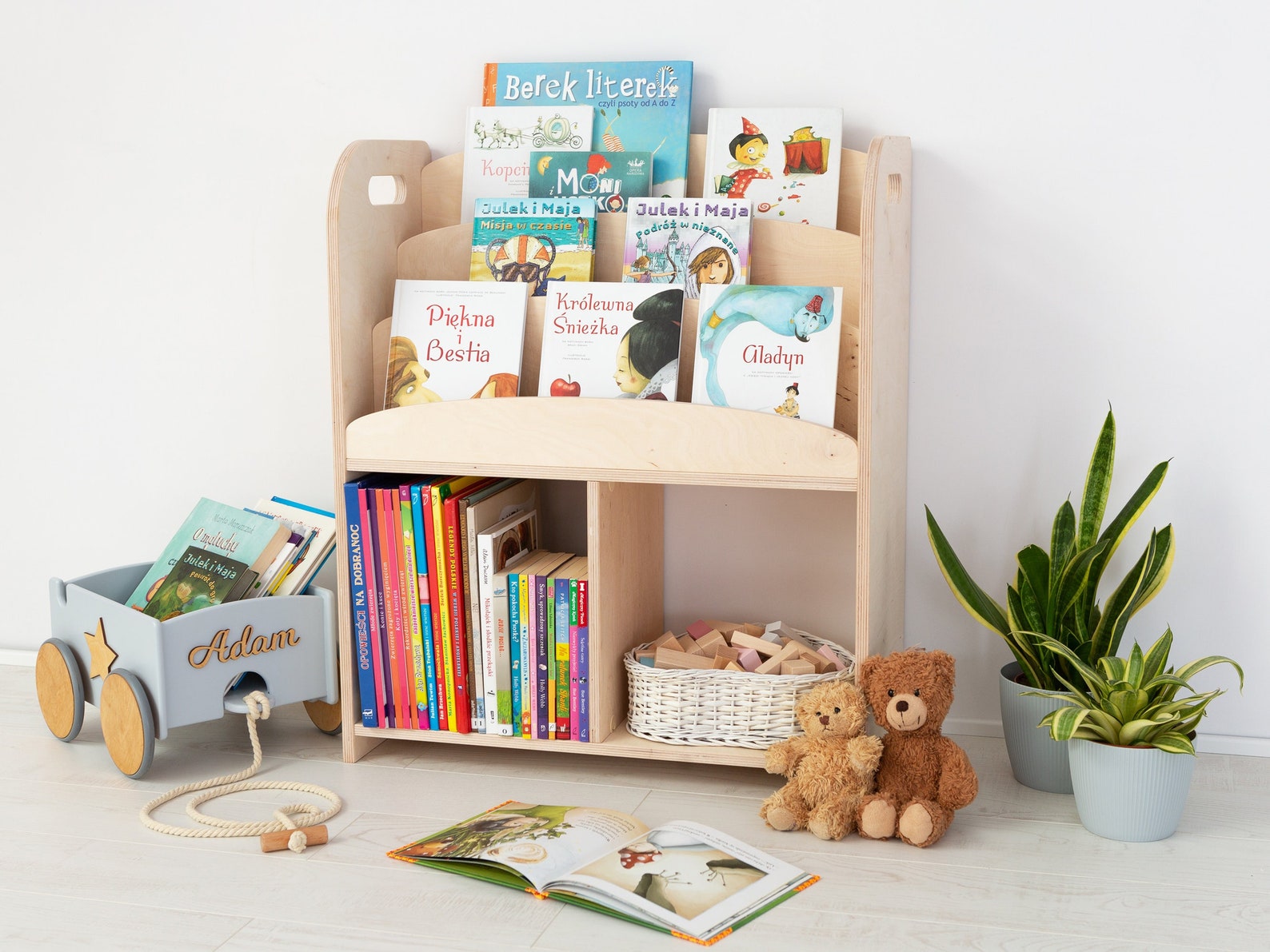 wooden bookshelf with multiple shelves and storage