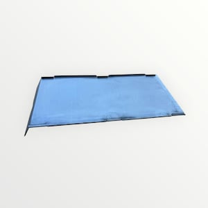 May include: A blue metal baking sheet with a black rim.