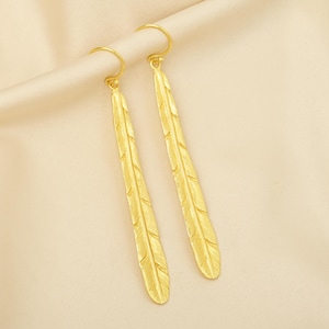 Gold Feather Dangle Earrings: Boho Statement Jewelry