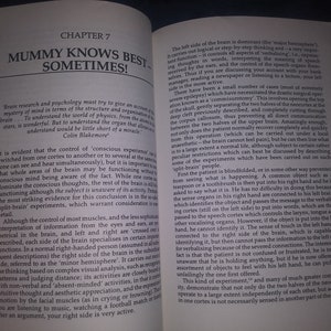 May include: A book open to a chapter titled "Mummy Knows Best... Sometimes!" The text discusses the functions of the left and right sides of the brain, including the concept of "split-brain" experiments.