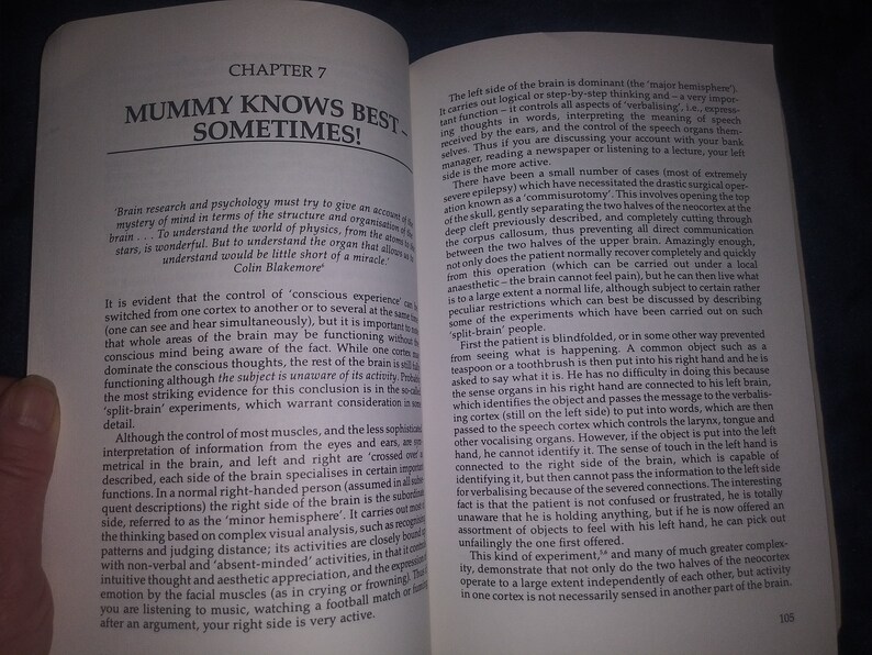 May include: A book open to a chapter titled "Mummy Knows Best... Sometimes!" The text discusses the functions of the left and right sides of the brain, including the concept of "split-brain" experiments.