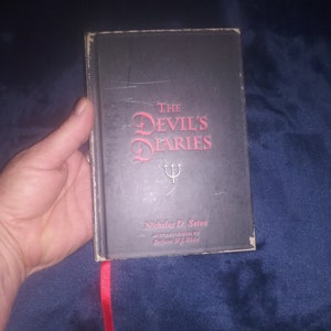 The Devils Diaries by Nicholas D Satan-Ask to bundle books for refund on S&H overages