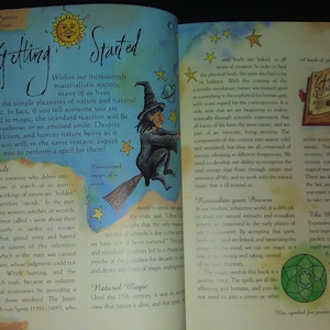 May include: An open book with a green symbol on the cover, titled "The Magic of the Wind." The book is open to a page with text about the magical nature of the wind and how to use it for protection.