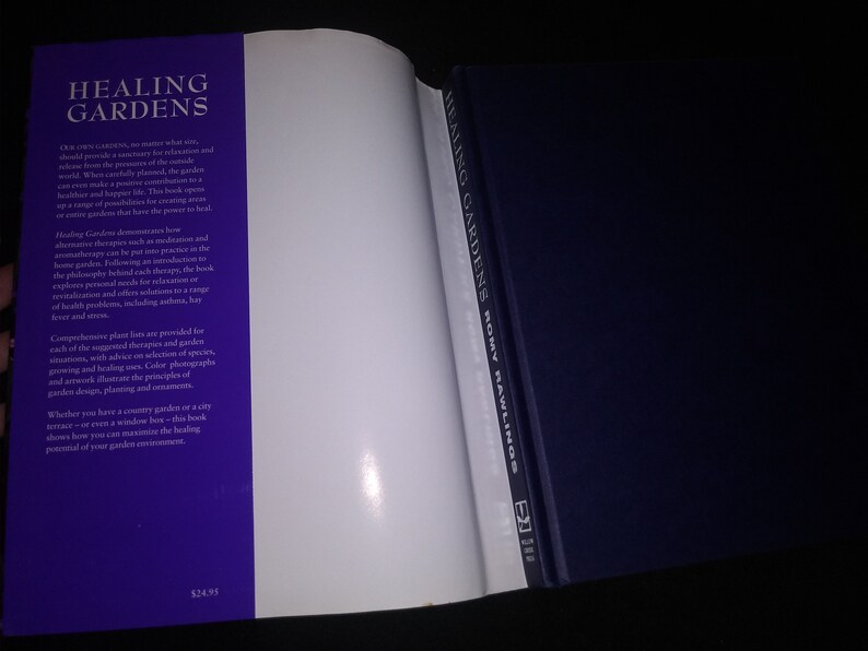 May include: A purple and white book titled "Healing Gardens" by Romy Rawlings. The book cover features text about the power of gardens to heal and includes information about the philosophy behind each therapy.