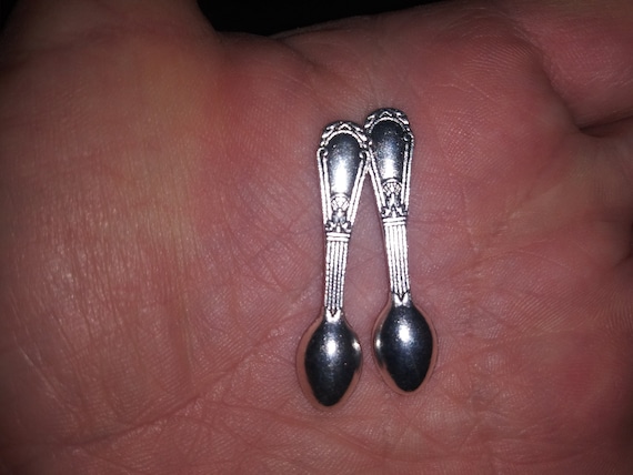 Bought 6 small metal spoons with holes in them at a second hand store in  Sweden, what are they for? : r/whatisthisthing