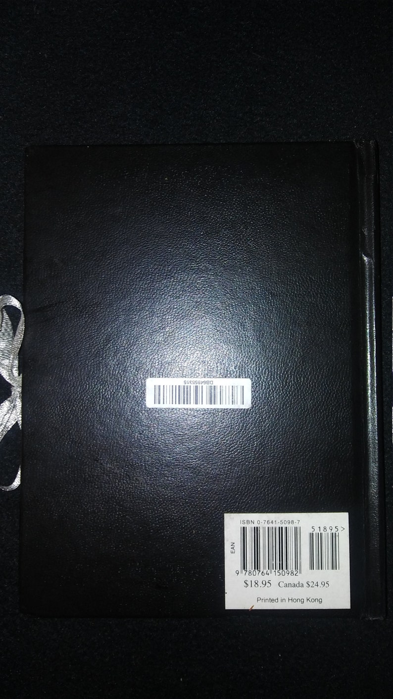 May include: Black book with a barcode and ISBN number on the back cover. The text reads "ISBN 0-7641-5098-7", "51895>", "9780764 150982", "$18.95 Canada $24.95", and "Printed in Hong Kong".