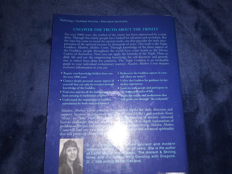 May include: Book cover with a blue background and the title "Uncover the Truth About the Trinity". The book explores the Triple Goddess: Maiden, Mother, Crone. The author is D.J. Conway, who has studied ancient and modern religions for 30 years.