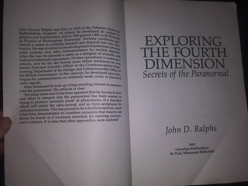 May include: A book cover with the title "Exploring the Fourth Dimension: Secrets of the Paranormal" by John D. Ralphs. The book cover is white with black text. The author's name is in a larger font size than the title.